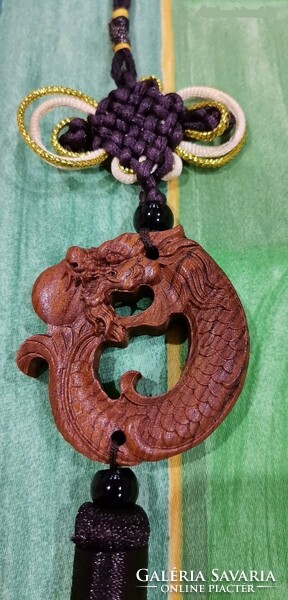 Real term. Feng shui rosewood pendant, amulet, protection symbol