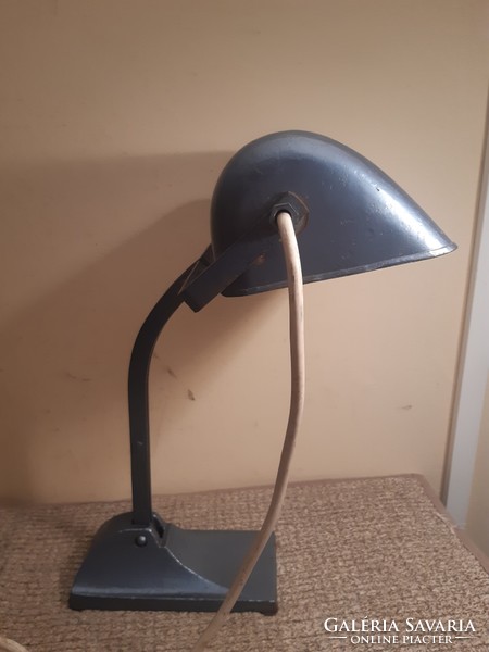 Old lamp with cast iron base