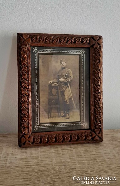 Original i in a carved frame. World War II military photo