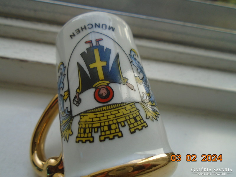 Opulently gilded, beer mug-shaped spice spreader with the coat of arms of a Benedictine monk from Munich