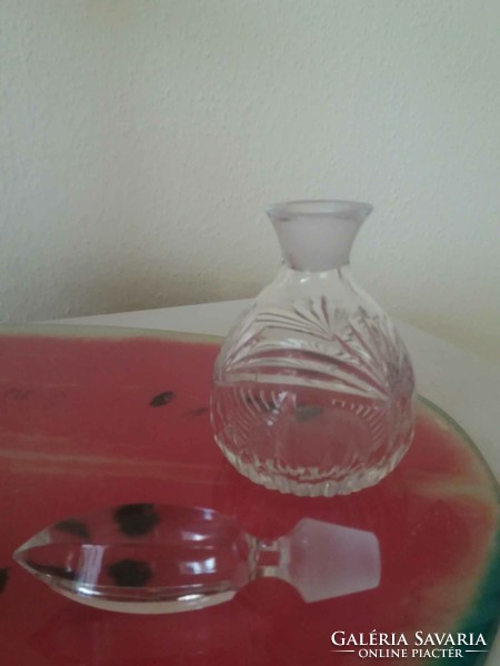 Crystal perfume bottle with polished stopper