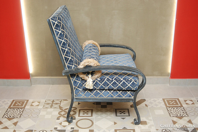 Armchair with blue upholstery in art deco style