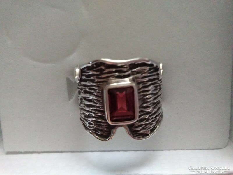 A special silver ring with a garnet stone