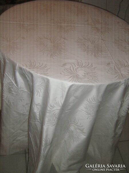 Beautiful snow-white huge antique elegant damask tablecloth with aster pattern