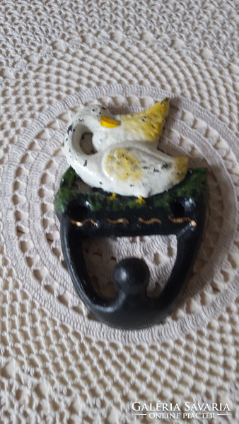 Hand-painted gooseneck cast iron wall hanger