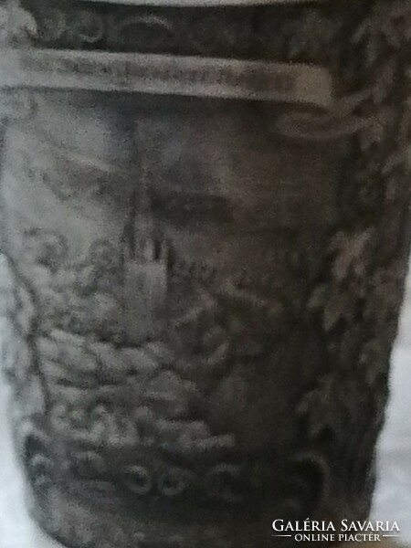 Richly decorated pewter cup with markings