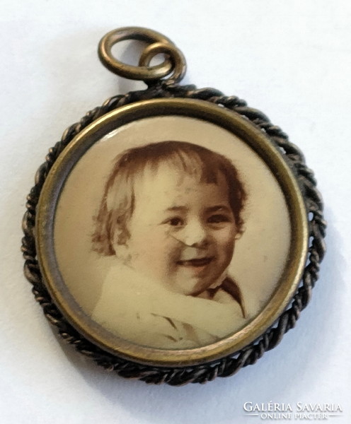 Antique red copper pendant with a child's photo