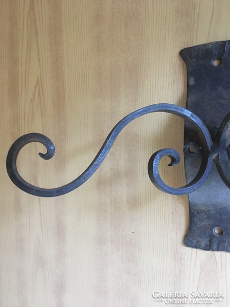 Old wrought iron wall bracket, wall lever