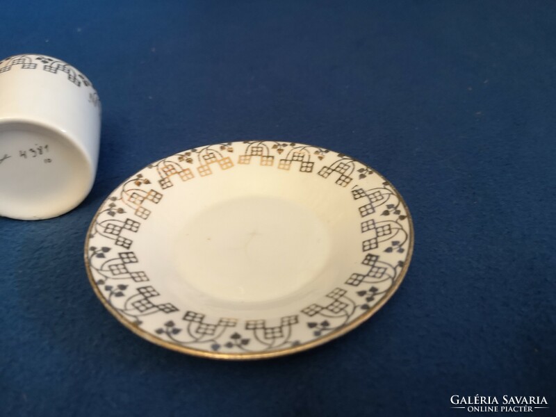 Gold-decorated porcelain mocha cup + saucer