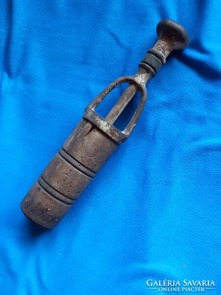 Antique cast iron wooden wine bottle stopper