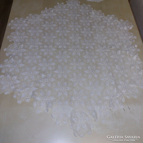 Crocheted white hexagonal tablecloth