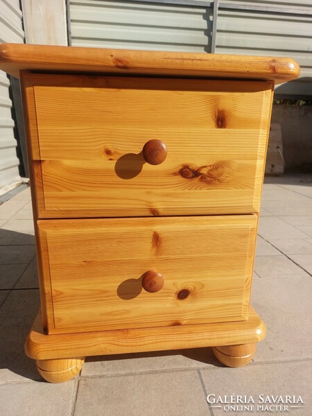 A 2-drawer pine chest of drawers and nightstand for sale. Furniture is in like new condition.