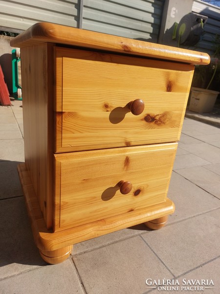 A 2-drawer pine chest of drawers and nightstand for sale. Furniture is in like new condition.