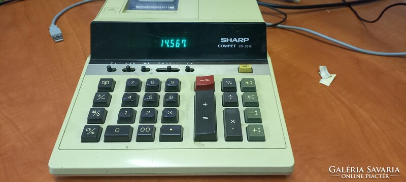 Retro tape calculator sharp