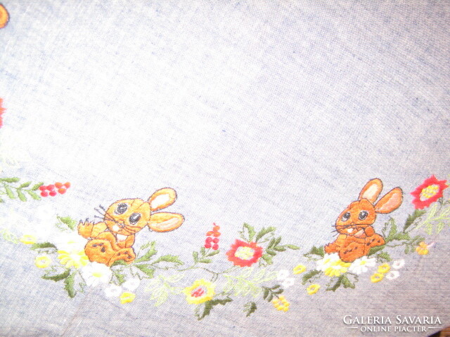 Beautiful machine-embroidered Easter madeira table cloth with a lace edge