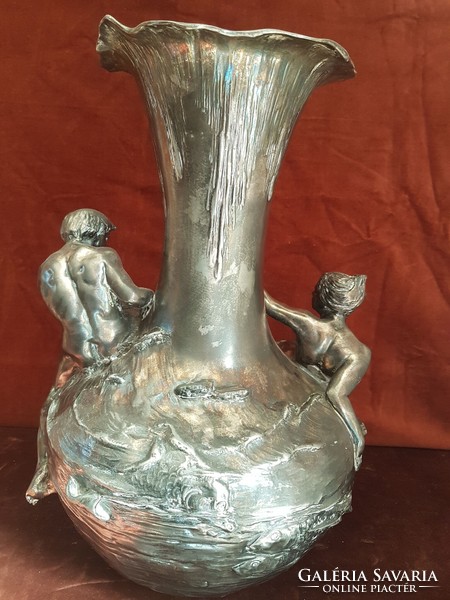 A wonderful art nouveau silver plated pewter vase