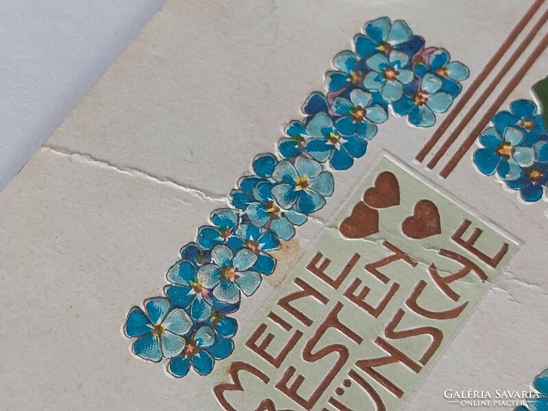 Old embossed postcard forget-me-not clover