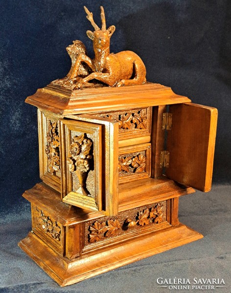 Beautiful Black Forest jewelry cabinet from the 19th century. From the century
