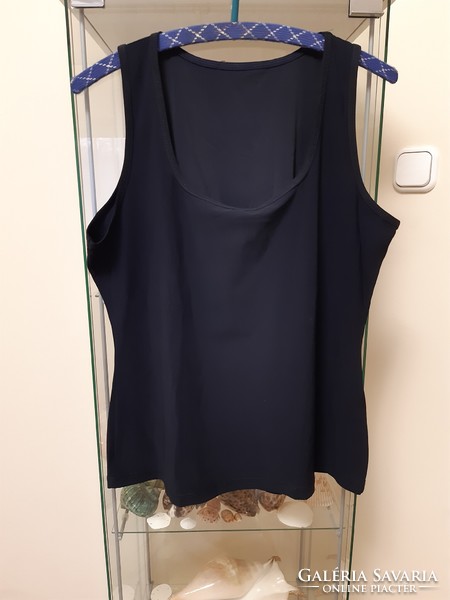 New, without tags, sleeveless, dark blue top, size M.