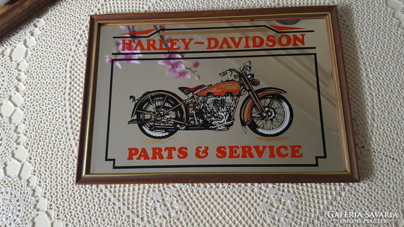Harley Davidson advertising mirror image, in a wooden frame