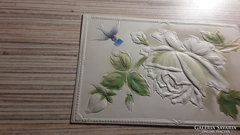 Antique extra embossed greeting card.