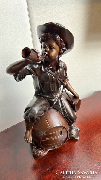 Horn-blowing boy - bronze statue