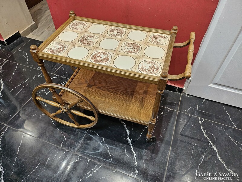 Old wooden cart with porcelain tiles