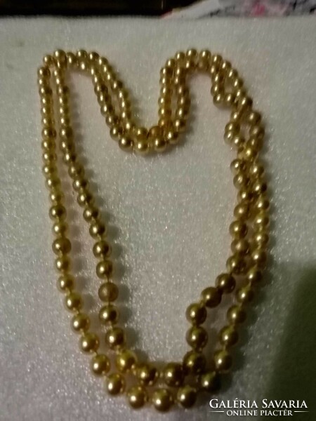 Beautiful antique gold-colored string of pearls 134 cm
