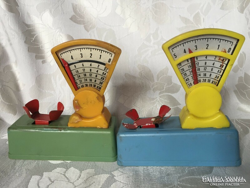 Old, retro toys-in-a-doll, dollhouse scales, mickey mouse donuts, chirping clockwork hen