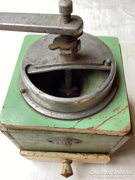 Old wooden coffee grinder.