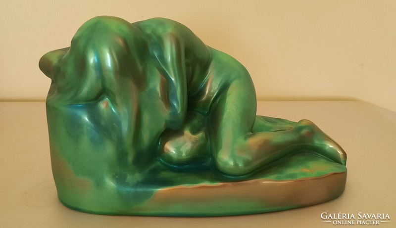 For sale is a marked Zsolnay eosin despair prostrate female nude. In perfect condition.
