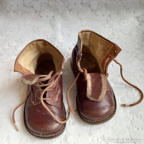 Old leather children's shoes