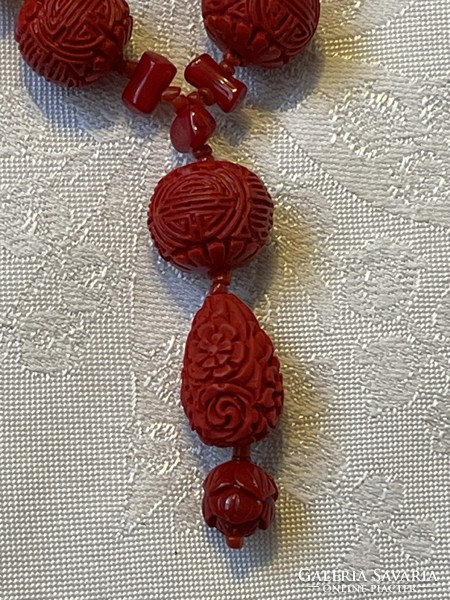 Beautiful genuine cinnabar necklace with coral and silver clasp.