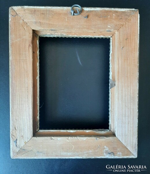 Old picture frame with painting
