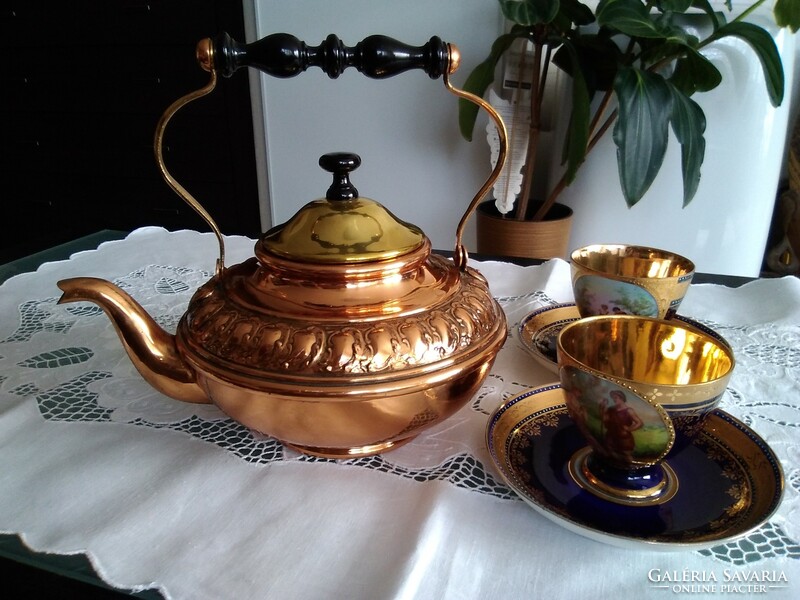 Old copper teapot with hammered pattern with wooden tongs, beautiful design!