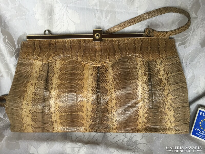 Old, retro, vintage snakeskin reticle, women's bag for theater, film props, but also for photography
