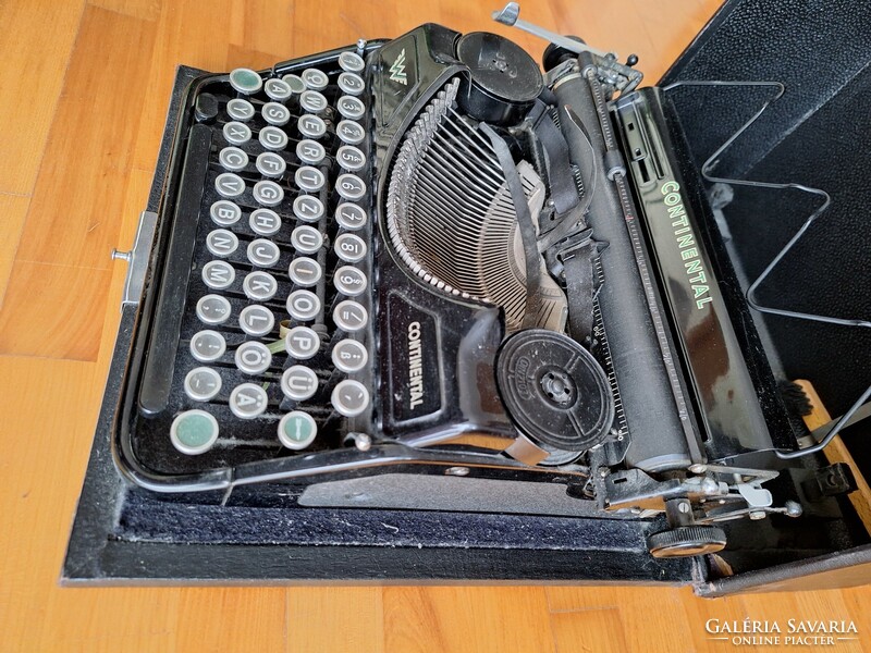 Antique continental typewriter with case