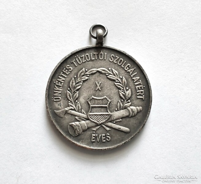 Medal for 10 years of voluntary fire service in 1958.