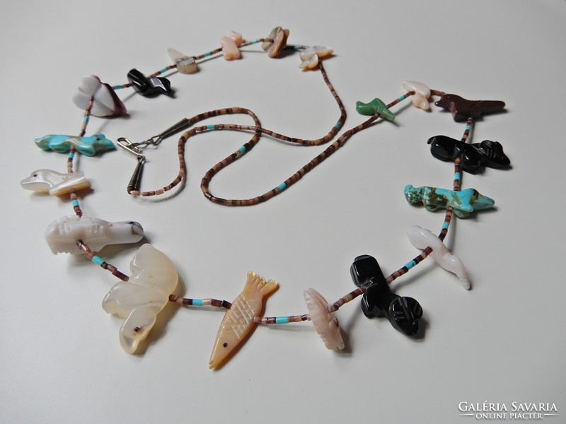 Old Navajo necklace carved from various minerals with a silver lock