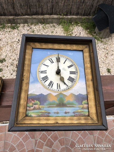 Old peasant clock or picture clock.