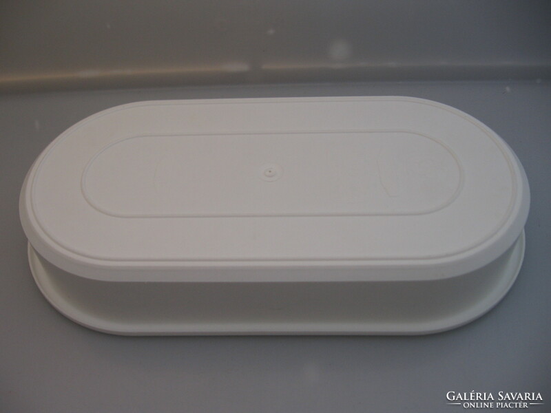 Oval white plastic bowl