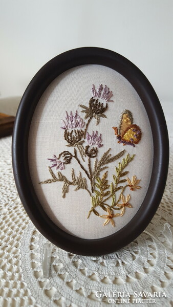 3 hand-sewn, embroidered small oval framed pictures.