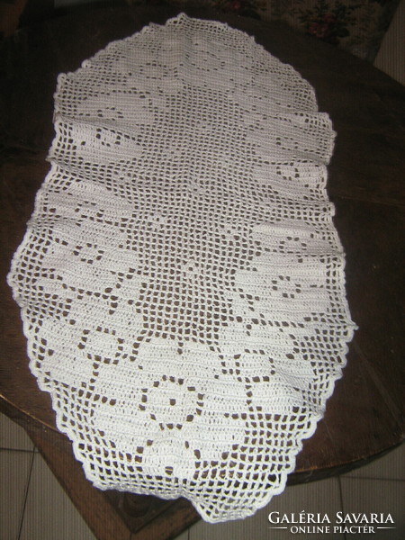 Beautiful white antique hand-crocheted floral tablecloth