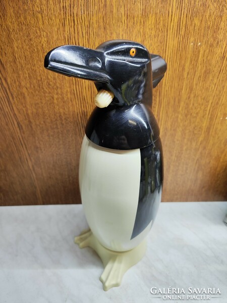 Retro soda siphon penguin