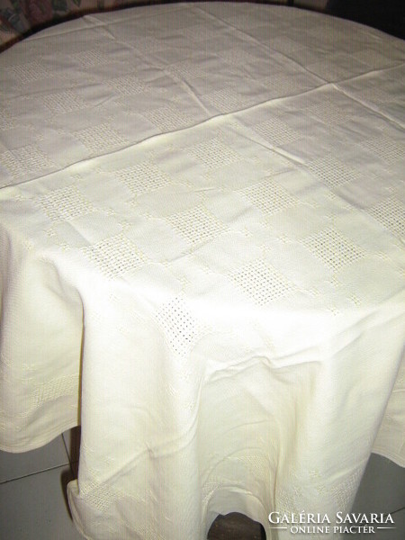 Beautiful woven tablecloth with yellow woven pattern