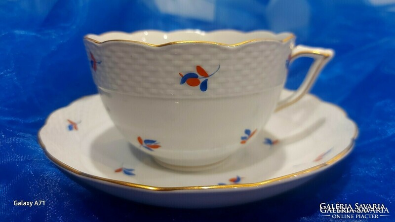 Antique porcelain tea and coffee cup from Herend.
