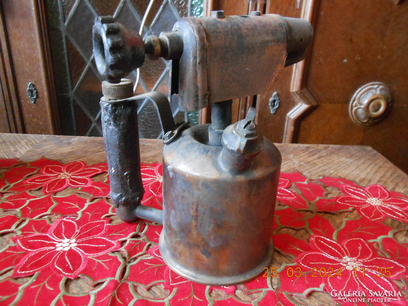 Old copper petrol lamp