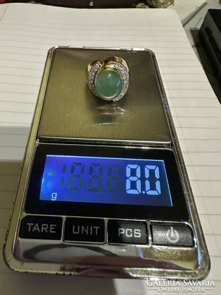 Nagyon szép 18 kr aranygyűrű szép brilekkel diszitve eladó!Ara:188.000.-
