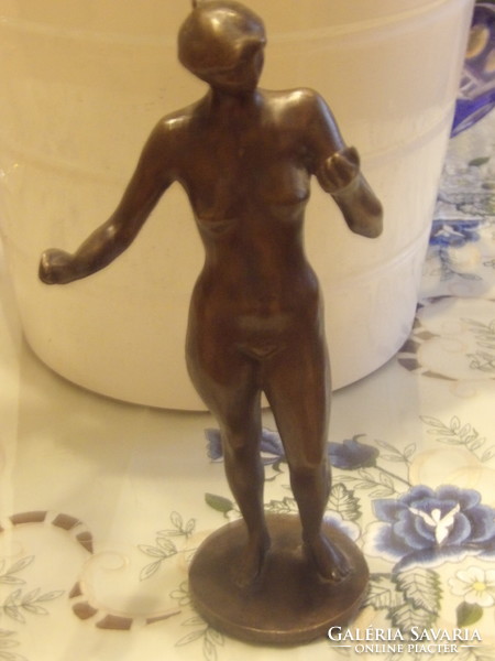Jánosí Blaskó: a bronze statue of a woman looking at herself in a mirror