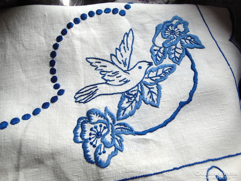 Antique embroidered linen tablecloth with birds